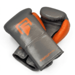 Premium grey and orange boxing gloves pair for training sparring and professional combat sports