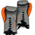 Premium grey and orange boxing gloves pair for training sparring and professional combat sports