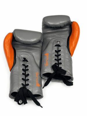Premium grey and orange boxing gloves pair for training sparring and professional combat sports